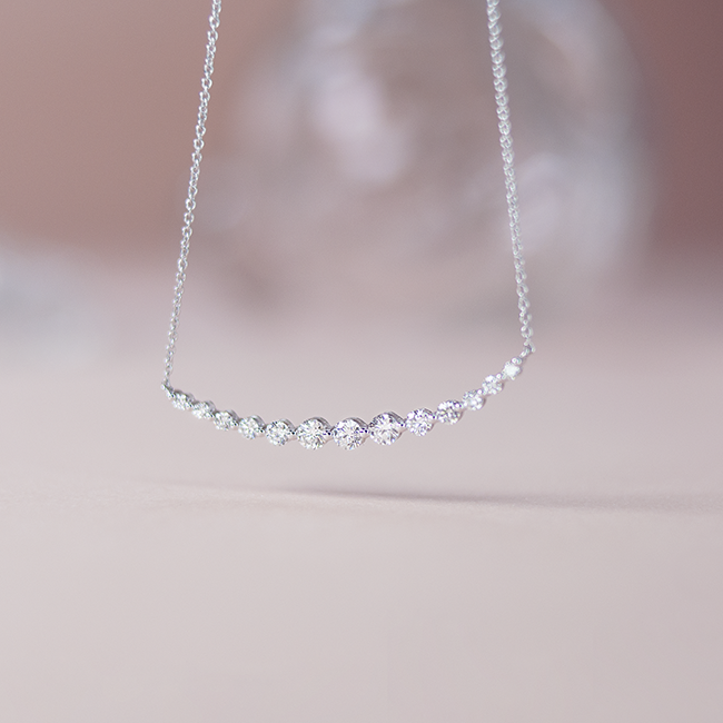 Curved diamond necklace